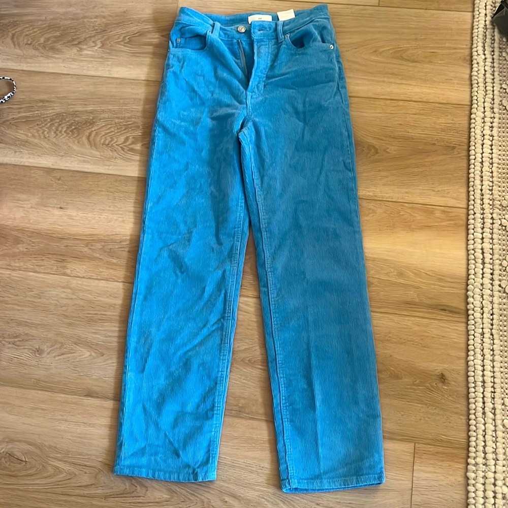 corduroy bright blue, never worn. size 4 long wide leg h and m.